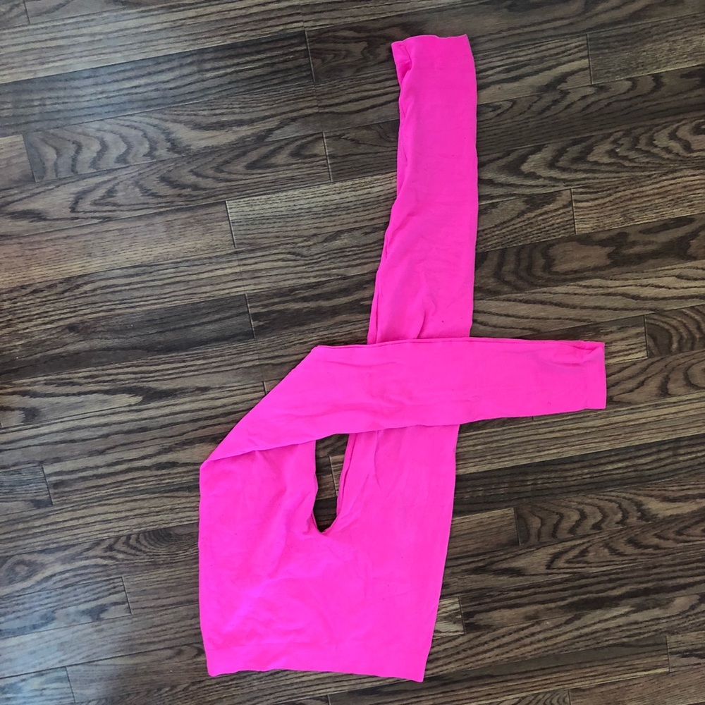 Neon pink sports or gymnastics tights / leggings